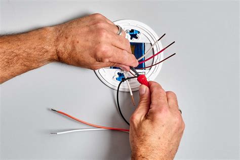 do hard wired smoke alarms nee a junction box|How to Install a Hardwired Smoke Alarm.